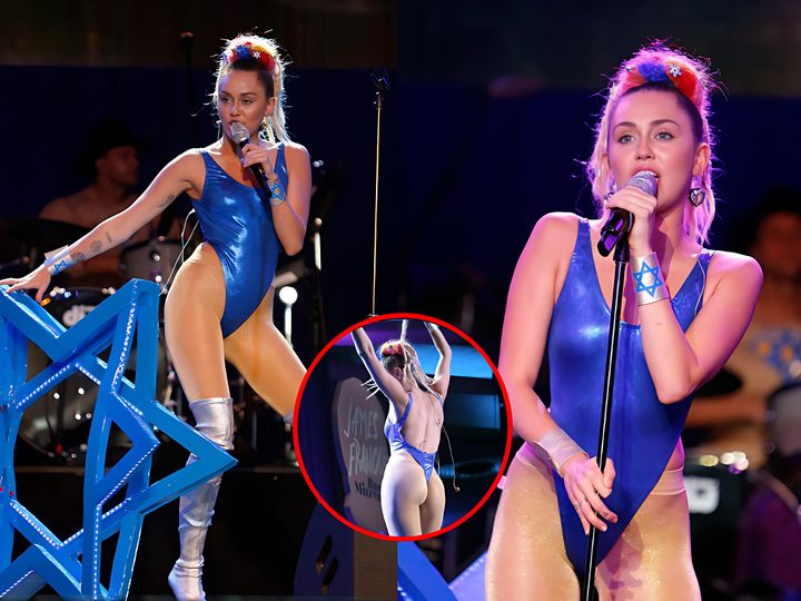 Miley Cyrus Displays Her Pert Posterior In Very Skimpy Blue Leotard And